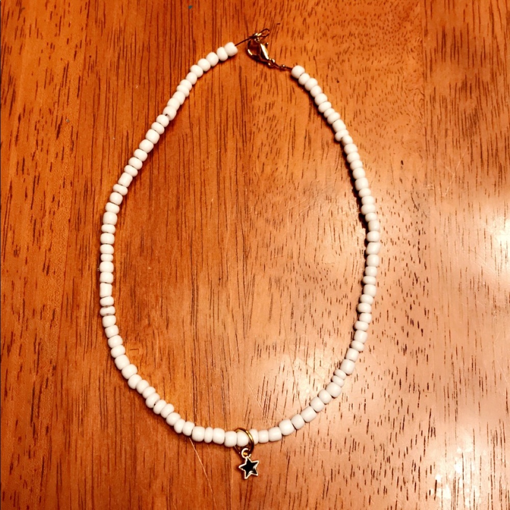 White beaded choker with a star charm!!